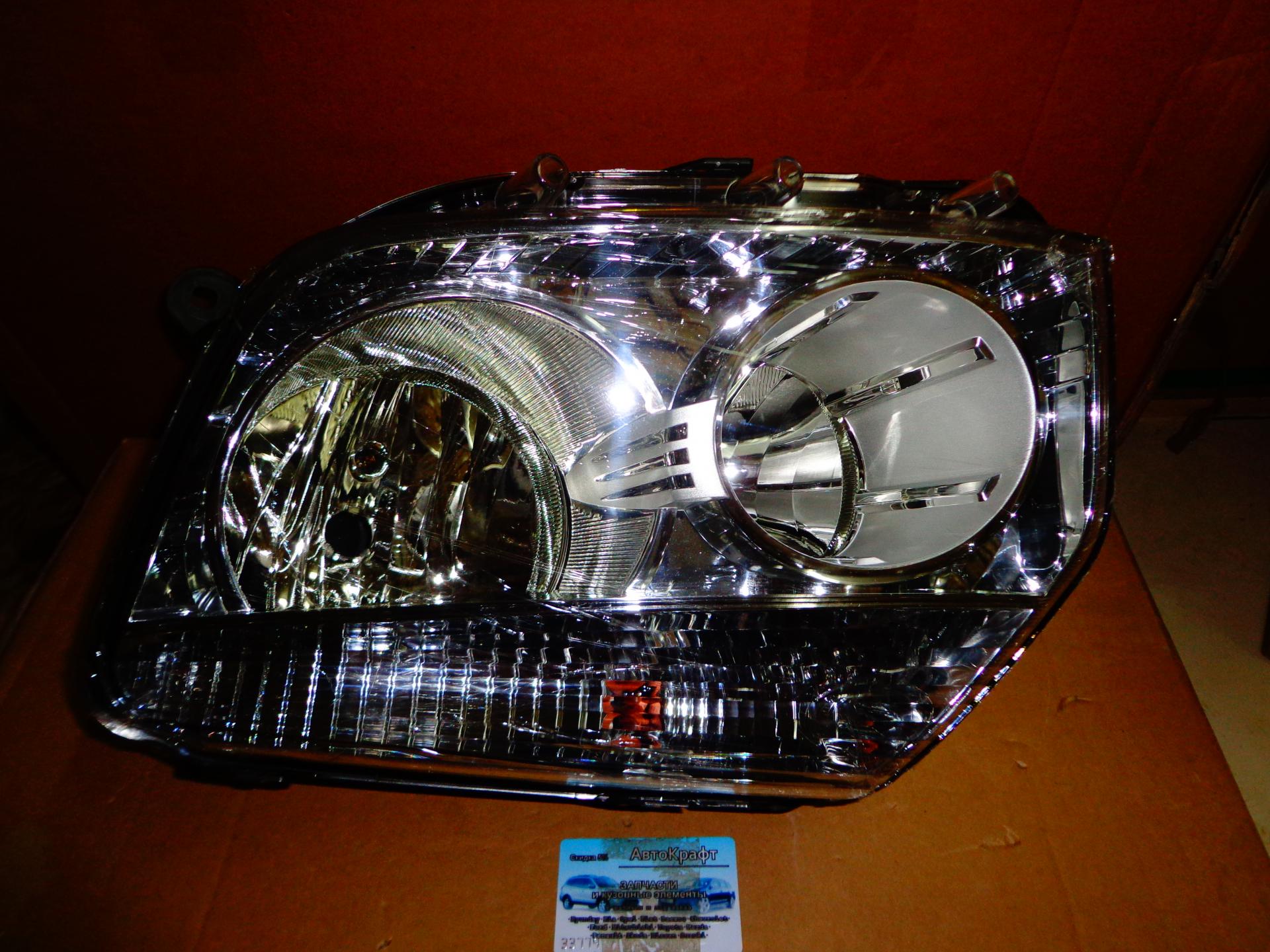 Фара левая хром Renault Duster 260600069R