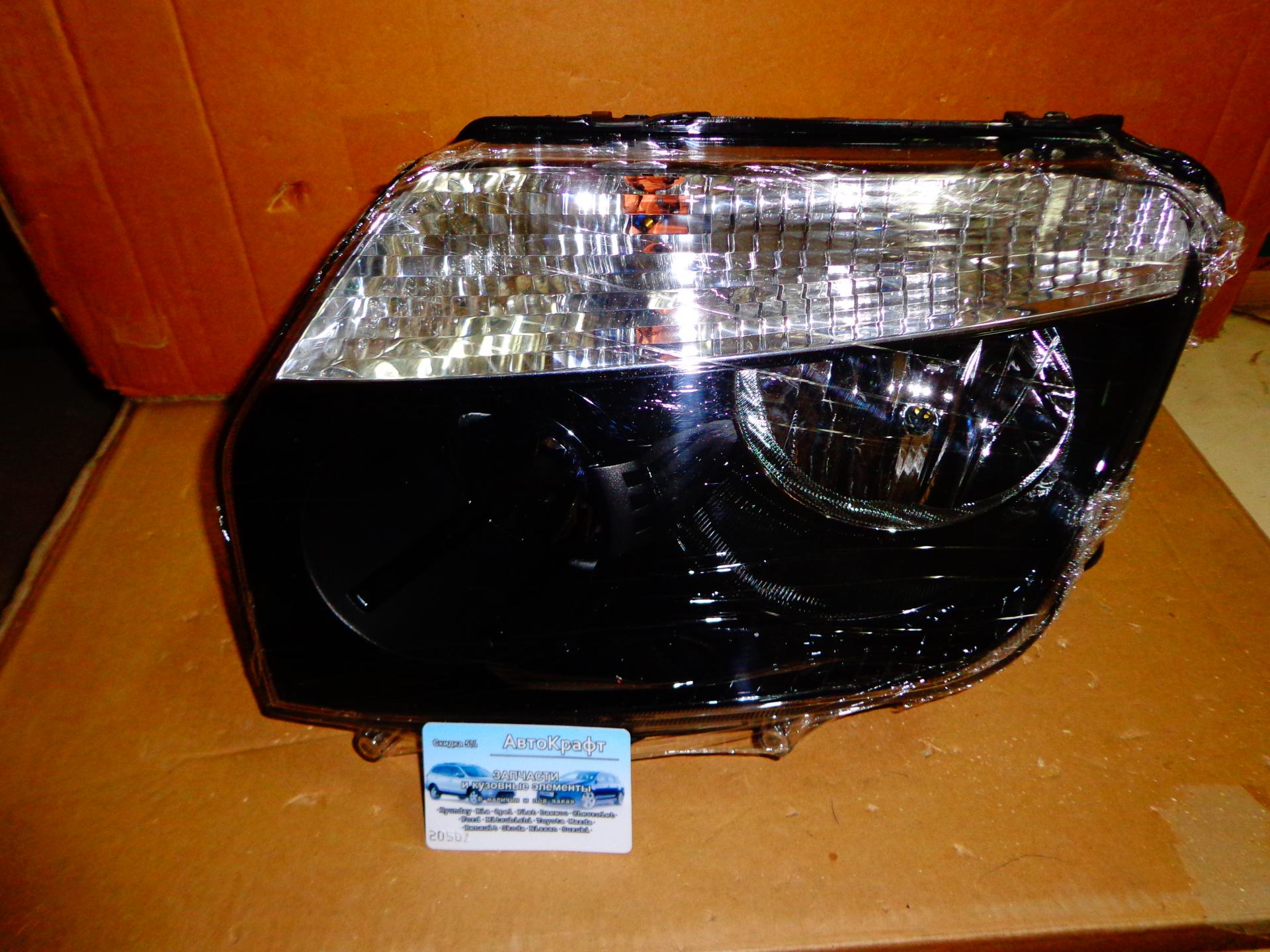Фара левая черная Renault Duster 260609877R