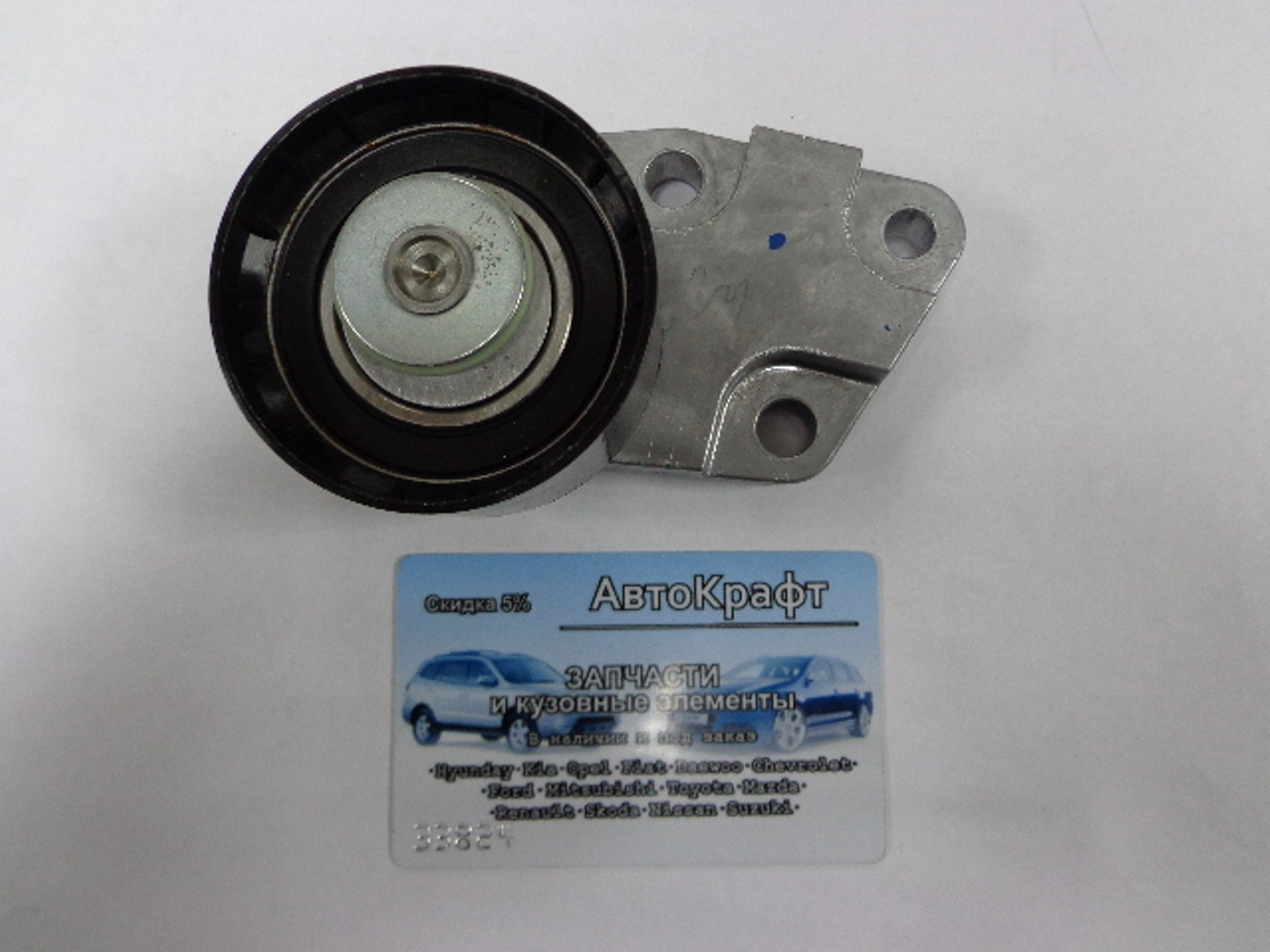 Ролик натяжной Chevrolet Aveo DONC 16V (оригинал) 25183772  