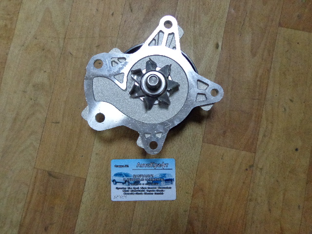 Насос водяной Toyota Auris 1610039466